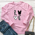 Cow print round neck long sleeved sweatshirt